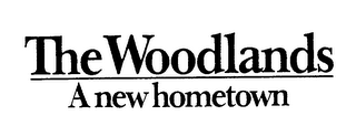 THE WOODLANDS A NEW HOMETOWN logo