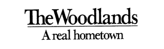THE WOODLANDS A REAL HOMETOWN logo