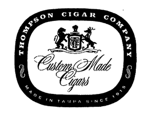 THOMPSON CIGAR COMPANY CUSTOM MADE CIGARS MADE IN TAMPA SINCE 1915 logo