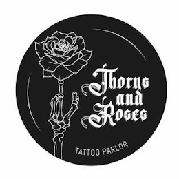 THORNS AND ROSES TATTOO PARLOR logo