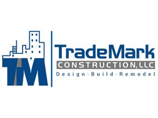 TM TRADEMARK CONSTRUCTION, LLC DESIGN · BUILD · REMODEL logo