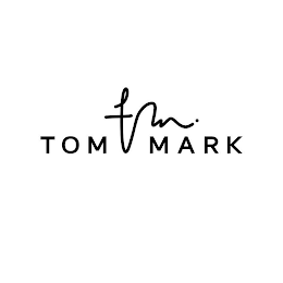 TOM TM. MARK logo