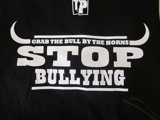 TP GRAB THE BULL BY THE HORNS STOP BULLYING logo