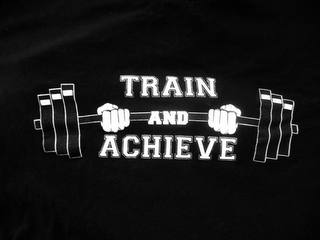 TRAIN AND ACHIEVE logo
