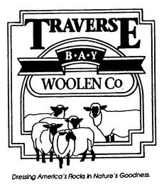 TRAVERSE B A Y WOOLEN CO DRESSING AMERICA'S FLOCKS IN NATURE'S GOODNESS. logo