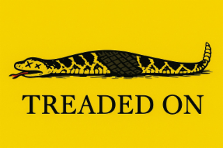 TREADED ON logo