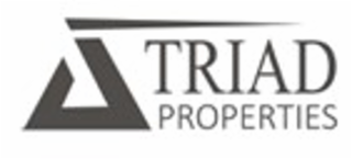 TRIAD PROPERTIES logo