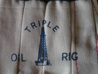 TRIPLE OIL RIG logo