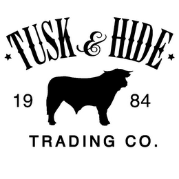·  TUSK & HIDE· TRADING CO. 19 84 logo