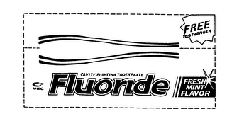 UEC FLUORIDE FRESH MINT FLAVOR CAVITY FIGHTING TOOTHPASTE FREE TOOTHBRUSH logo