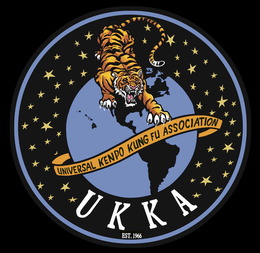 UNIVERSAL KENPO KUNG FU ASSOCIATION UKKA EST. 1966 logo