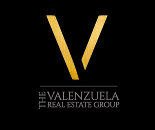V THE VALENZUELA REAL ESTATE GROUP logo