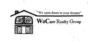 W C WILCARR REALTY GROUP "WE OPEN DOORS TO YOUR DREAMS" logo