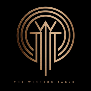 W THE WINNERS TABLE