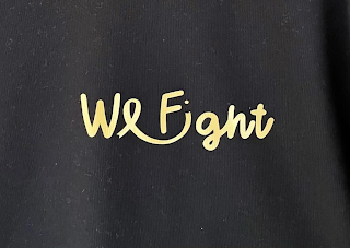 WE FIGHT logo