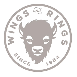WINGS AND RINGS SINCE 1984 logo