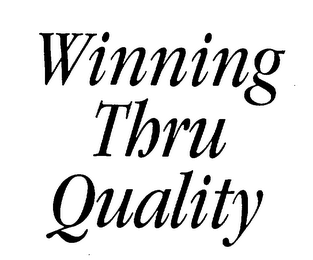 WINNING THRU QUALITY logo