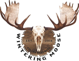 WINTERING MOOSE CUSTOM WOODWORK EST. 2018 logo