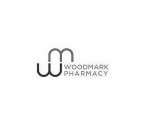 WM WOODMARK PHARMACY logo