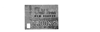 WOLF BROS. RUM SOAKED CROOKS DIPPED IN WINE logo