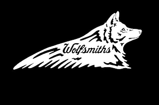 WOLFSMITHS logo