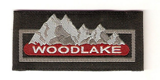 WOODLAKE logo