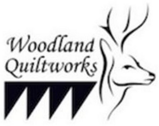 WOODLAND QUILTWORKS logo