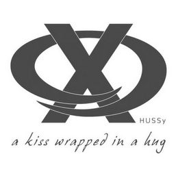X O HUSSY A KISS WRAPPED IN A HUG logo