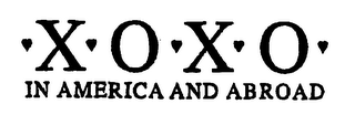 X O X O IN AMERICA AND ABROAD logo