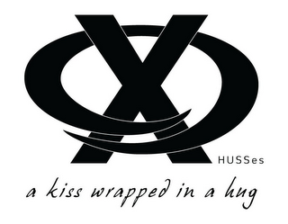 XO HUSSES A KISS WRAPPED IN A HUG logo